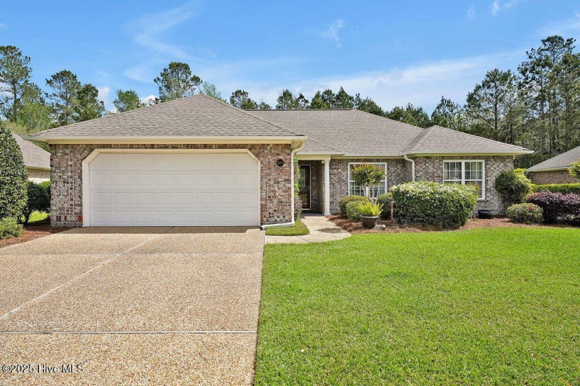 Enjoy low maintenance living in this 3-bedroom, 2-bathroom brick - Beach Home for sale in Leland, North Carolina on Beachhouse.com