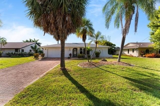 Experience elevated waterfront living in this updated 3 bed / 2 - Beach Home for sale in Cape Coral, Florida on Beachhouse.com