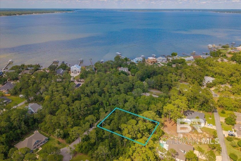Wooded interior lot on Innerarity Island offering the ideal - Beach Lot for sale in Pensacola, Florida on Beachhouse.com