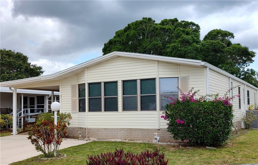 Offering custom-built 1-owner home w/private yard on a perimeter - Beach Home for sale in Barefoot Bay, Florida on Beachhouse.com