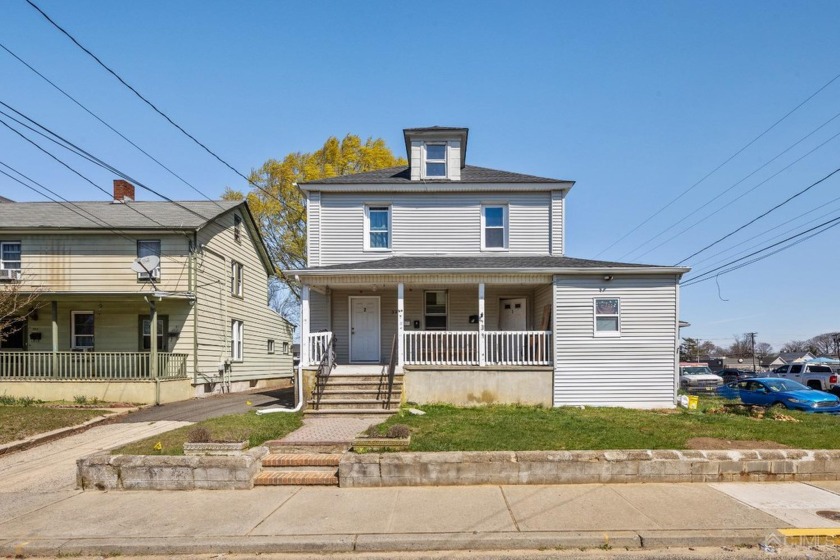 This spacious 3-family home offers a lucrative investment - Beach Lot for sale in Long Branch, New Jersey on Beachhouse.com