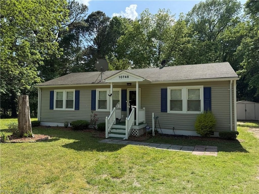 Enjoy the best of both worlds with this room 3-bedroom, 2-bath - Beach Home for sale in Carrollton, Virginia on Beachhouse.com