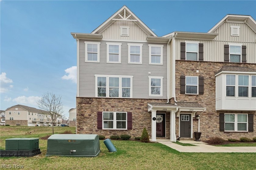Welcome to refined modern living in this stunning three-story - Beach Condo for sale in Avon, Ohio on Beachhouse.com