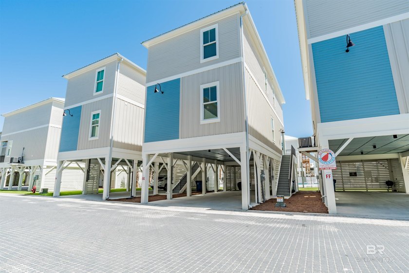Coastal charm meets modern comfort in this stunning poolside - Beach Home for sale in Gulf Shores, Alabama on Beachhouse.com
