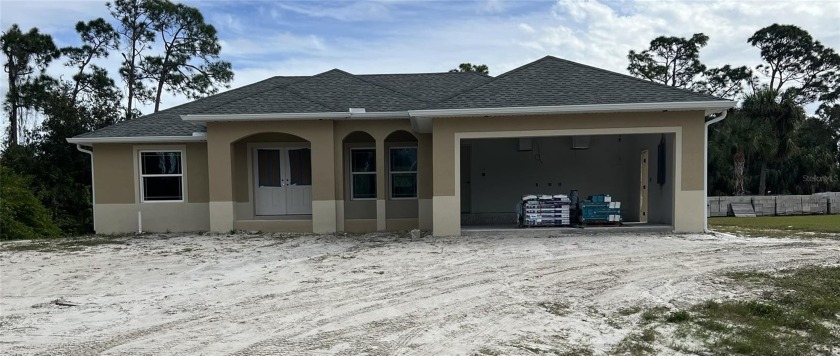 Under Construction. 3 bedroom 2 bath 2,235 Sq Ft  home on a - Beach Home for sale in Port Charlotte, Florida on Beachhouse.com