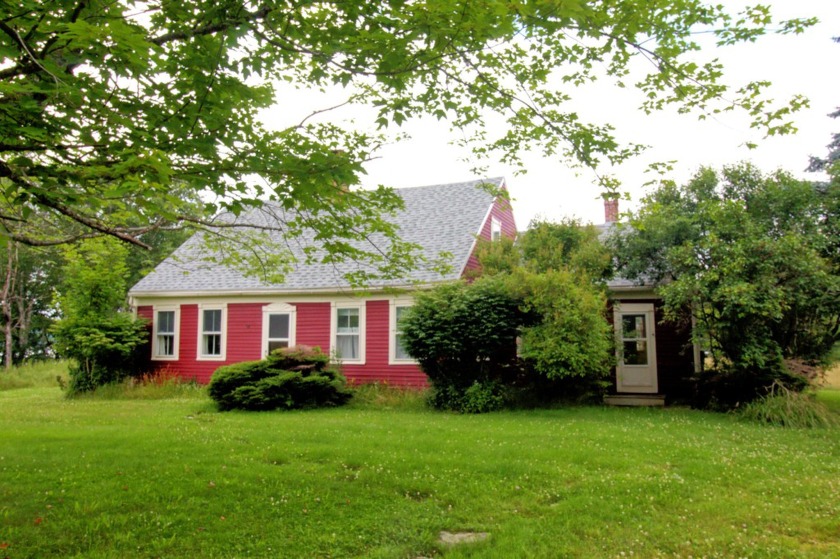 This secluded and peaceful antique New England cape style home - Beach Home for sale in Orland, Maine on Beachhouse.com