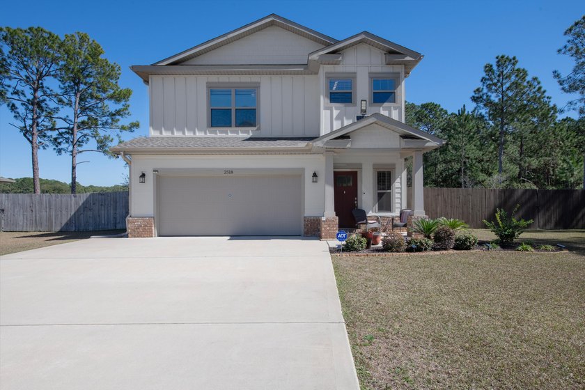 Tucked away on a peaceful .27-acre cul-de-sac lot, this - Beach Home for sale in Navarre, Florida on Beachhouse.com