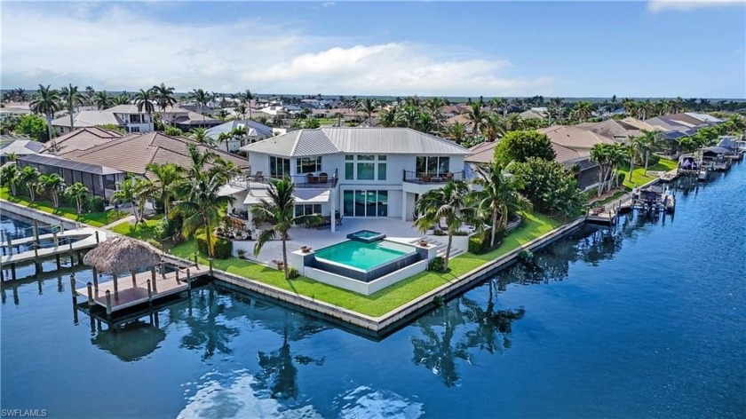 Welcome to this custom-built 2018 luxury estate located in the - Beach Home for sale in Cape Coral, Florida on Beachhouse.com