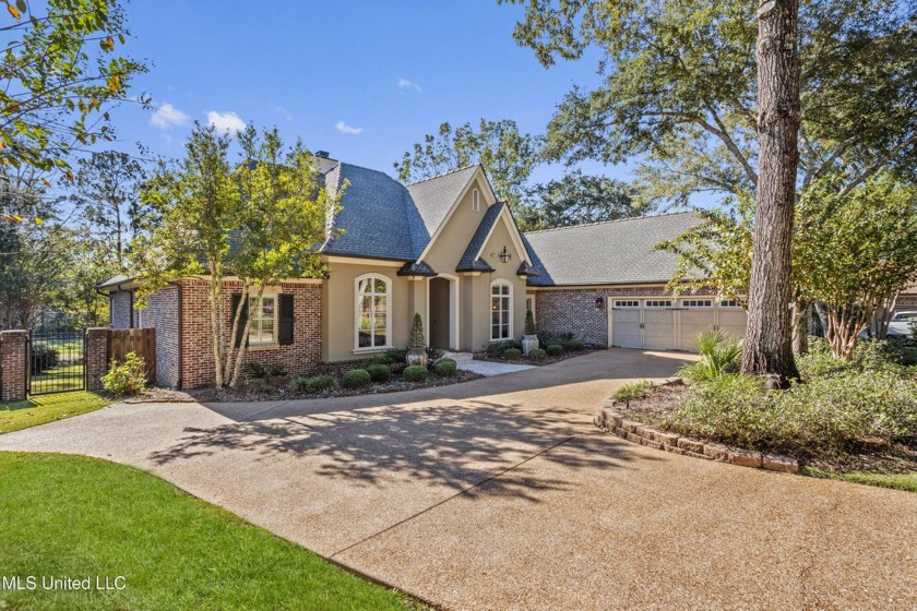 This gorgeous, custom home in the high demand  Oaks of Pass - Beach Home for sale in Pass Christian, Mississippi on Beachhouse.com