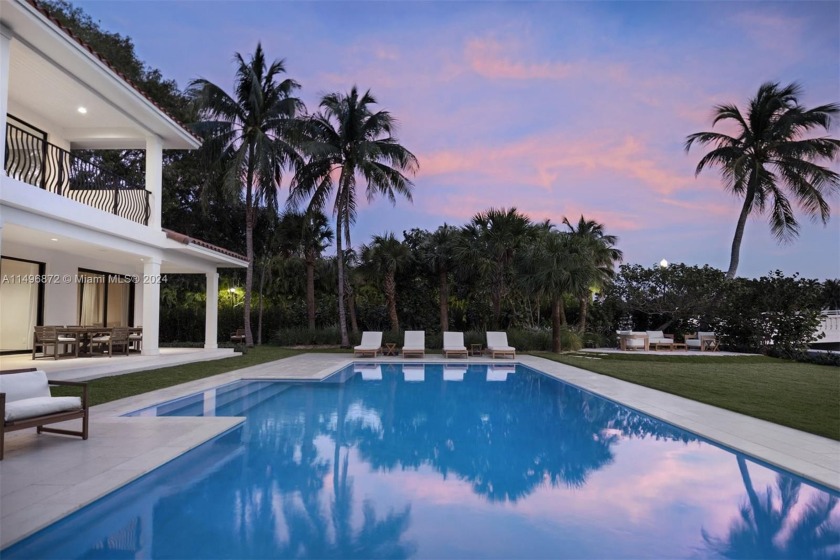 Nestled in the prestigious, guard-gated Sunset Islands I, this - Beach Home for sale in Miami Beach, Florida on Beachhouse.com