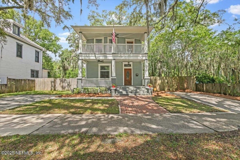 Nestled on a double lot surrounded by ancient oak trees, the - Beach Home for sale in Jacksonville, Florida on Beachhouse.com