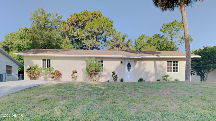 Come see this charming home with an open floor plan! This house - Beach Home for sale in Daytona Beach, Florida on Beachhouse.com