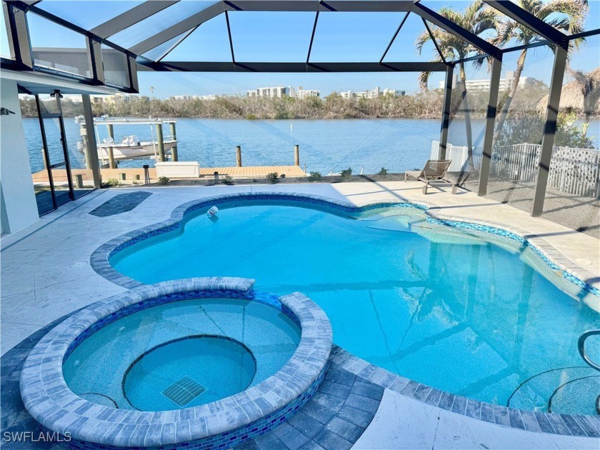 Breathtaking view over the pool and out to the Lagoon.  Peaceful - Beach Home for sale in Fort Myers Beach, Florida on Beachhouse.com