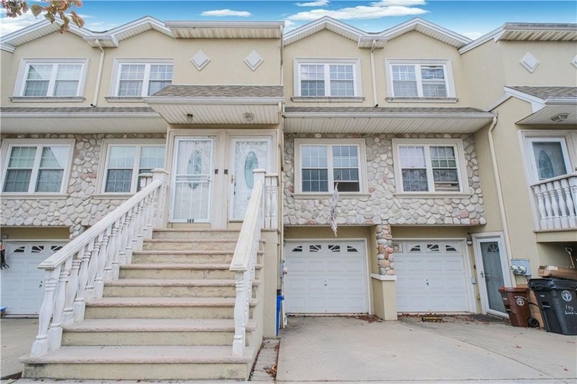 Welcome to this beautiful 3-story, 2-family home located in one - Beach Home for sale in Staten  Island, New York on Beachhouse.com