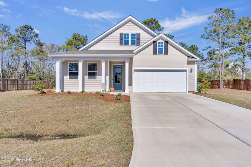 Discover this practically new 2023-built home, offering modern - Beach Home for sale in Sneads Ferry, North Carolina on Beachhouse.com