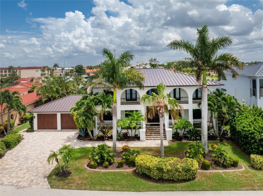 ABSOLUTELY STUNNING CUSTOM WATERFRONT HOME offers fabulous long - Beach Home for sale in Punta Gorda, Florida on Beachhouse.com