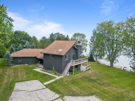 Experience lakeside luxury with this stunning Quad-level home - Beach Home for sale in Algoma, Wisconsin on Beachhouse.com