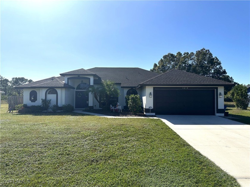 Custom built FIVE bedroom THREE bath home connected to central - Beach Home for sale in Lehigh Acres, Florida on Beachhouse.com