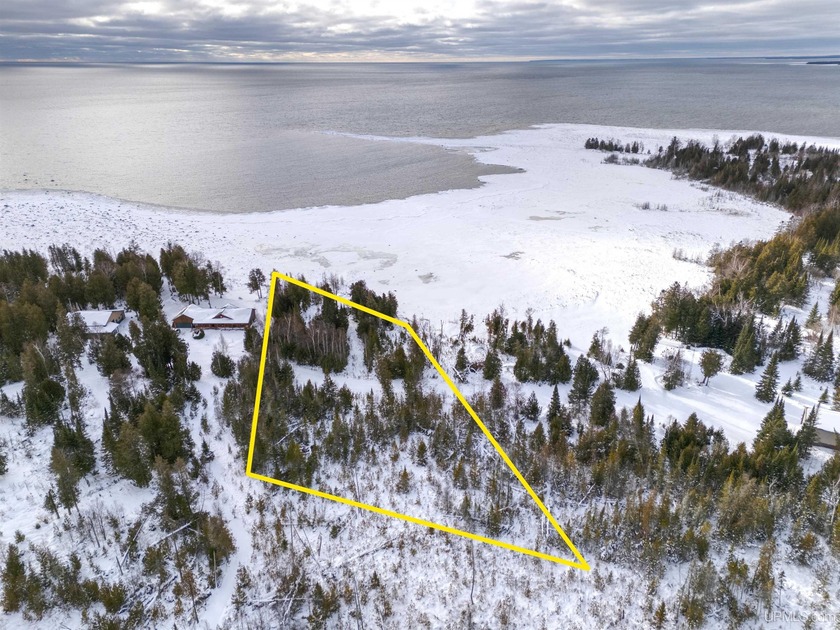 Discover a rare opportunity to own 1.08 acres of Lake Michigan - Beach Lot for sale in Manistique, Michigan on Beachhouse.com