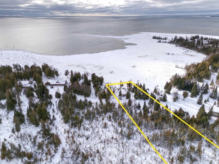 Discover a rare opportunity to own 1.08 acres of Lake Michigan - Beach Lot for sale in Manistique, Michigan on Beachhouse.com
