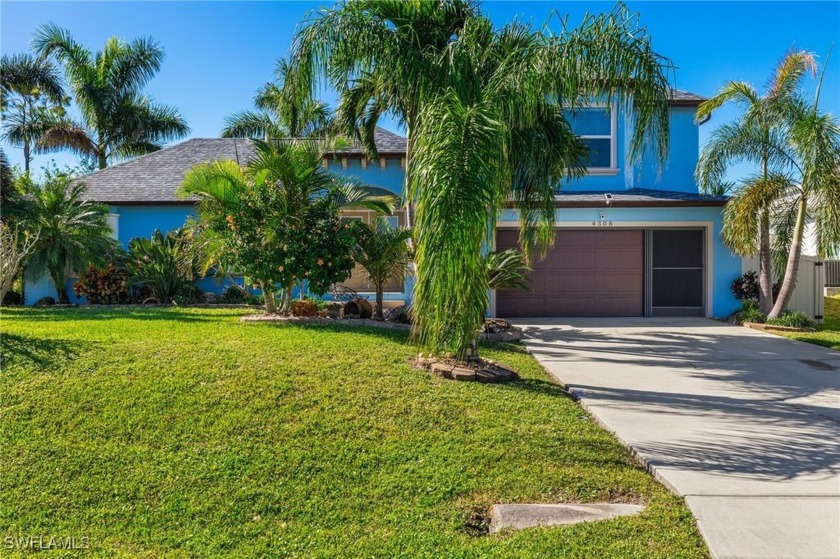 Freshwater Front Home with lush tropical grounds! Discover this - Beach Home for sale in Cape Coral, Florida on Beachhouse.com