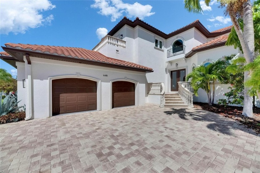 Experience luxury coastal living in this breathtaking Spanish - Beach Home for sale in Apollo Beach, Florida on Beachhouse.com