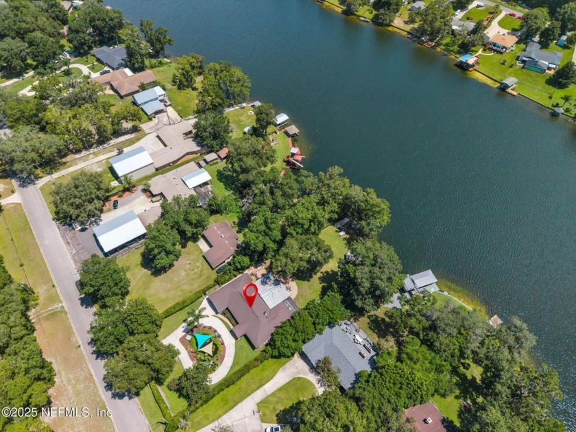Lake Asbury Paradise with Resort-Style waterfront Living! - Beach Home for sale in Green Cove Springs, Florida on Beachhouse.com