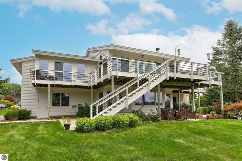 Discover lakeside luxury living at its finest in the - Beach Home for sale in Spring Lake, Michigan on Beachhouse.com