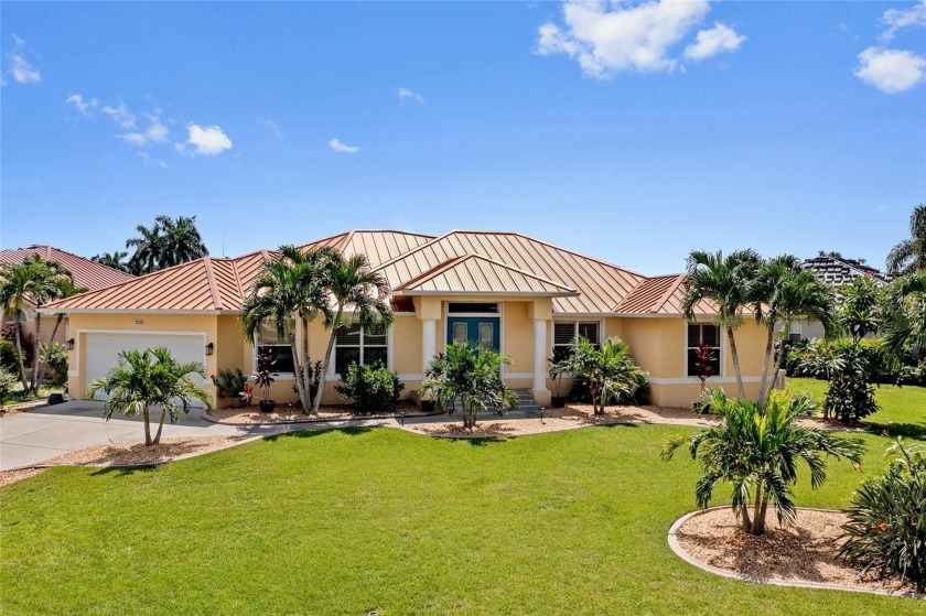 PUNTA GORDA ISLES! IMPRESSIVE 3 BEDROOM + DEN, 2 BATH, 2-CAR - Beach Home for sale in Punta Gorda, Florida on Beachhouse.com