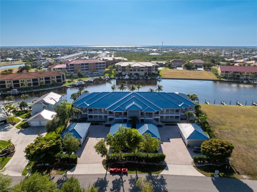 TOP FLOOR END UNIT. SWEEPING WATER VIEW, QUICK HARBOR ACCESS - Beach Condo for sale in Punta Gorda, Florida on Beachhouse.com