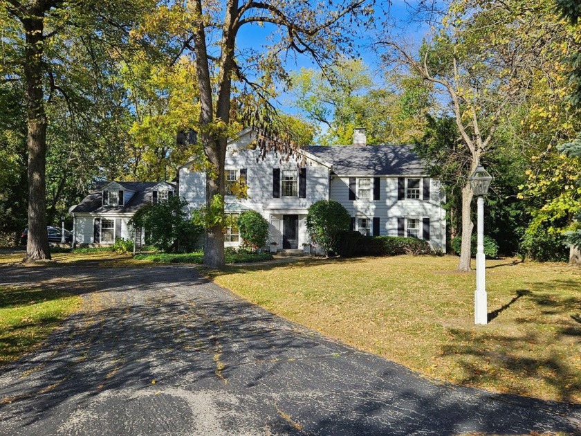 Gracious colonial set on a large lot in a coved east of Lake - Beach Home for sale in Fox Point, Wisconsin on Beachhouse.com