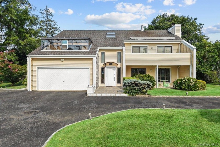 This lovely water view home in Glen Cove is in good, move-in - Beach Home for sale in Glen Cove, New York on Beachhouse.com