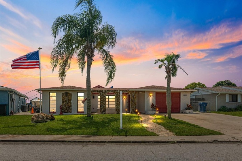 Lakefront Living at Its Finest Spacious & Updated Home on Lake - Beach Home for sale in Holiday, Florida on Beachhouse.com
