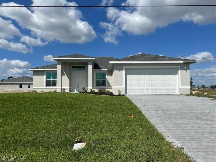 SPECTACULAR CUSTOM NEW CONSTRUCTION SITUATED ON AN - Beach Home for sale in Cape Coral, Florida on Beachhouse.com