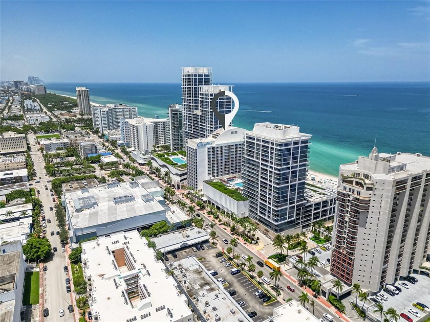 Experience elevated living in Unit 214 at the renowned Carillon - Beach Condo for sale in Miami Beach, Florida on Beachhouse.com