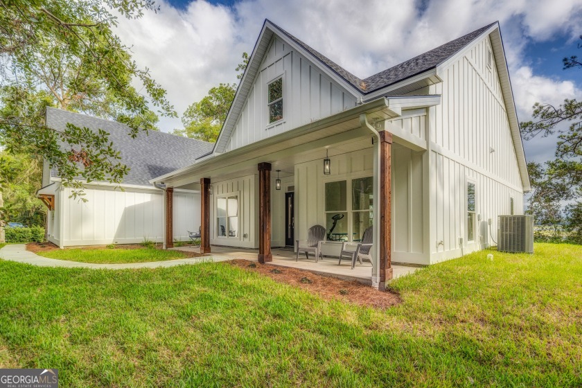 Nestled on a serene peninsula at the end of a quiet cul-de-sac - Beach Home for sale in Woodbine, Georgia on Beachhouse.com