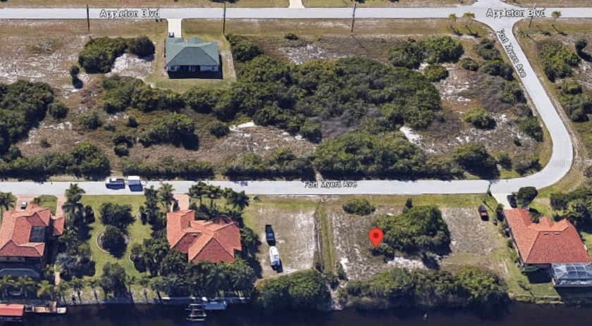 WATERFRONT BUILDING LOT. CITY WATER & SEWER AVAILABLE already in - Beach Lot for sale in Port Charlotte, Florida on Beachhouse.com