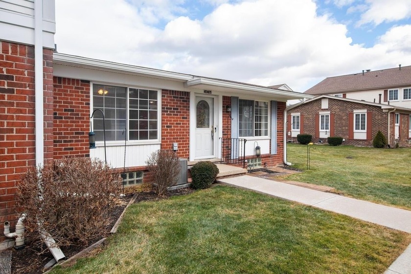 Discover this charming ranch-style condo nestled near the serene - Beach Condo for sale in Harrison, Michigan on Beachhouse.com