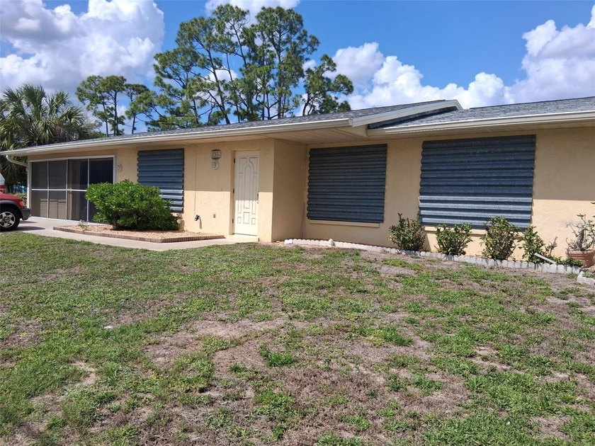 This well-maintained property provides a functional layout - Beach Home for sale in Port Charlotte, Florida on Beachhouse.com