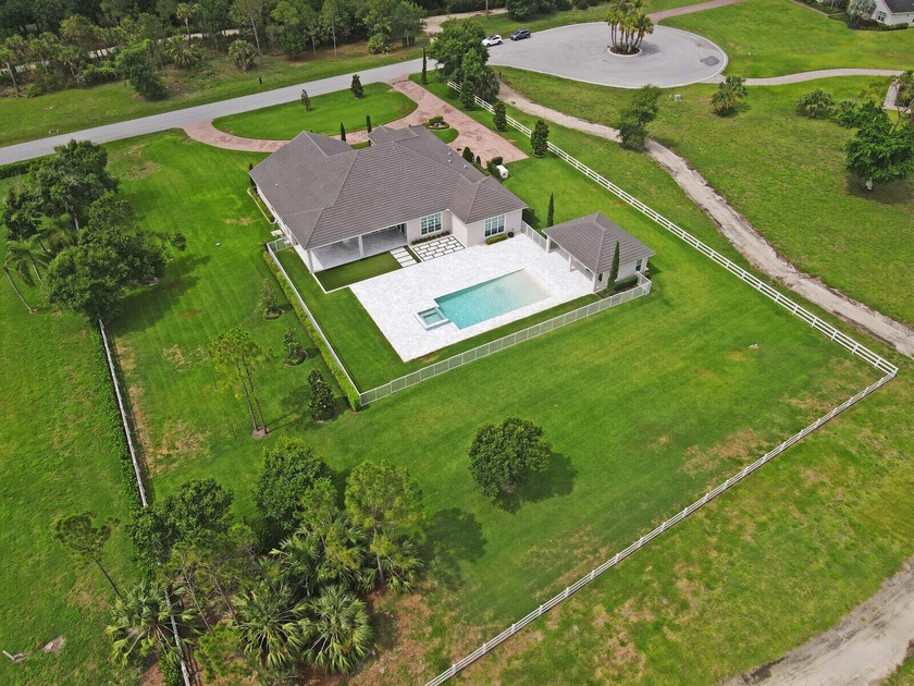 Welcome home to your private estate in Reynolds Ranch. Boasting - Beach Home for sale in Jupiter, Florida on Beachhouse.com