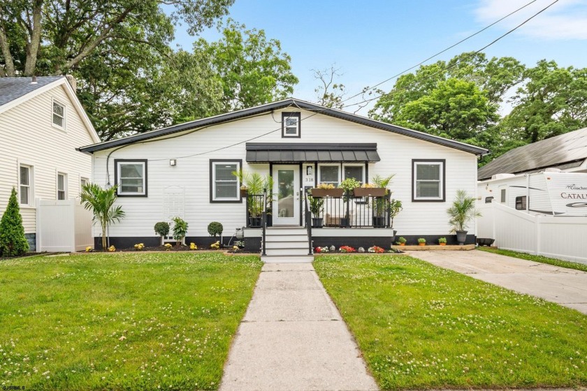 Welcome to your dream modern farmhouse! Located in a charming - Beach Home for sale in Northfield, New Jersey on Beachhouse.com