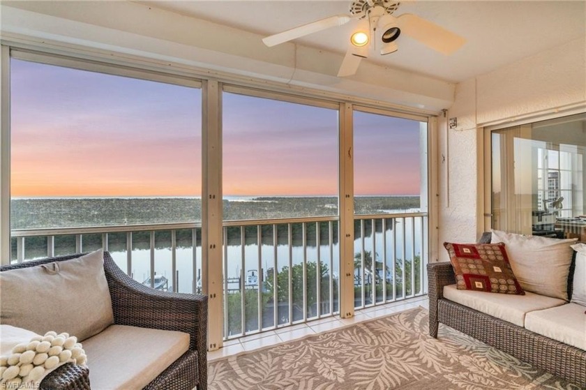 STUNNING 8TH FLOOR WATERFRONT UNIT WITH PANORAMIC VIEWS! This - Beach Home for sale in Naples, Florida on Beachhouse.com