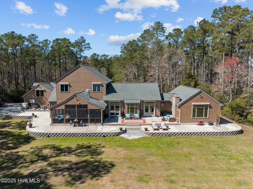 A remarkable waterfront estate, astounding in its impeccable - Beach Home for sale in Merritt, North Carolina on Beachhouse.com