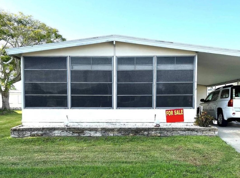 This 1978 two-bedroom two bath mobile home is located in the - Beach Home for sale in Ellenton, Florida on Beachhouse.com