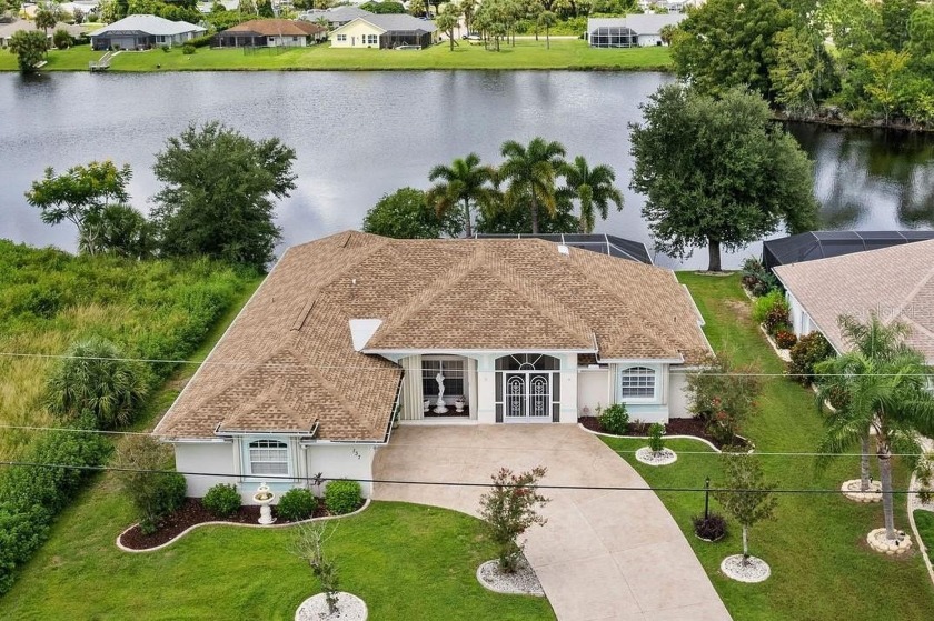 BEAUTIFUL LAKEFRONT 3 Bedroom, 3 Bathroom, 2 Car Garage, Pool - Beach Home for sale in Port Charlotte, Florida on Beachhouse.com