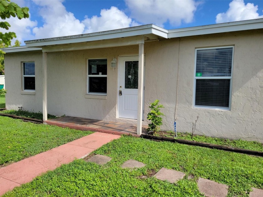 Solidly-constructed, compact home with tile floors throughout - Beach Home for sale in Port Charlotte, Florida on Beachhouse.com