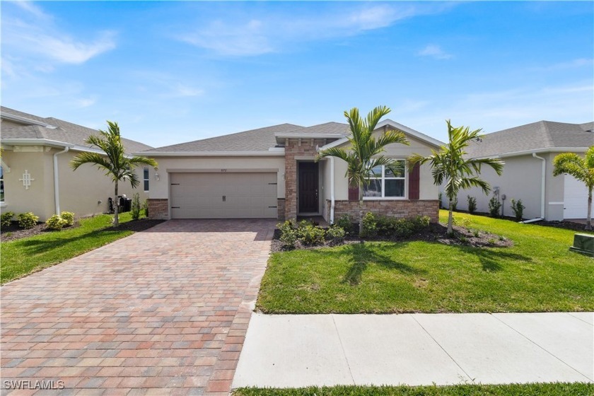 Welcome to your dream home in the coveted gated community of - Beach Home for sale in Cape Coral, Florida on Beachhouse.com