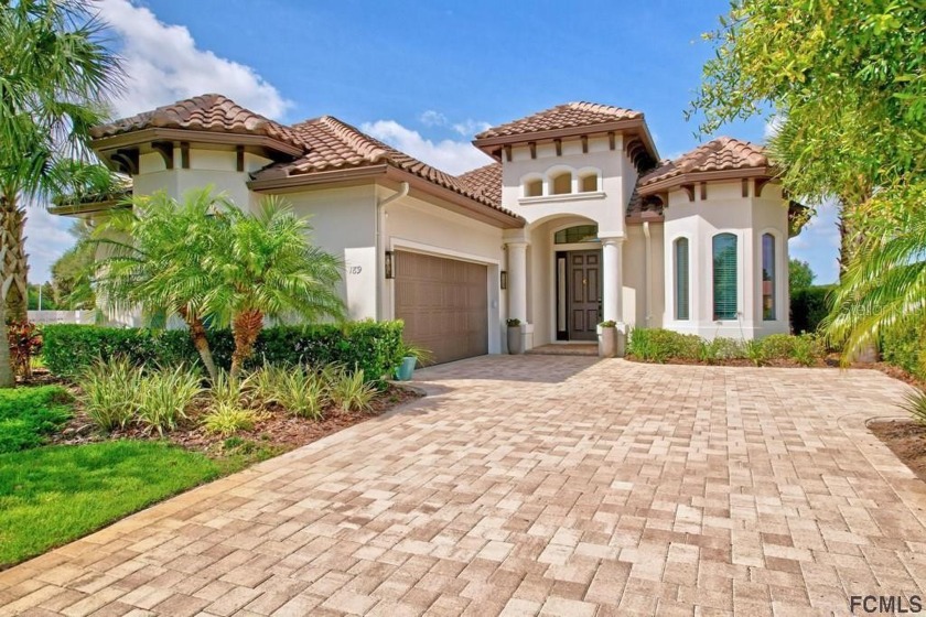 Welcome to an exquisite custom home in The Conservatory at - Beach Home for sale in Palm Coast, Florida on Beachhouse.com