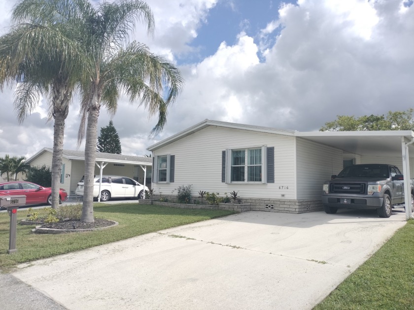 CALLING ALL BUYERS! Gorgeous 3 bed 2 bath on the lake! 1,452 sq - Beach Home for sale in Fort Pierce, Florida on Beachhouse.com
