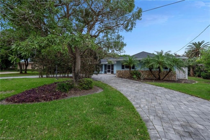 Welcome to this charming 3-bedroom, 2-bathroom pool home located - Beach Home for sale in Naples, Florida on Beachhouse.com